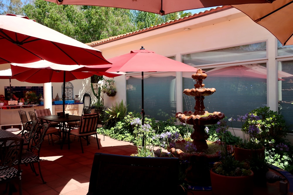 Restaurant patio with outdoor dining chairs, tables and shade umbrellas