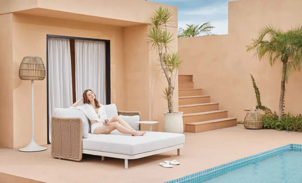 Resort poolside daybed and outdoor lounge furniture