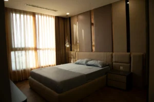 Upholstered bed designs for hotels with wall headboard