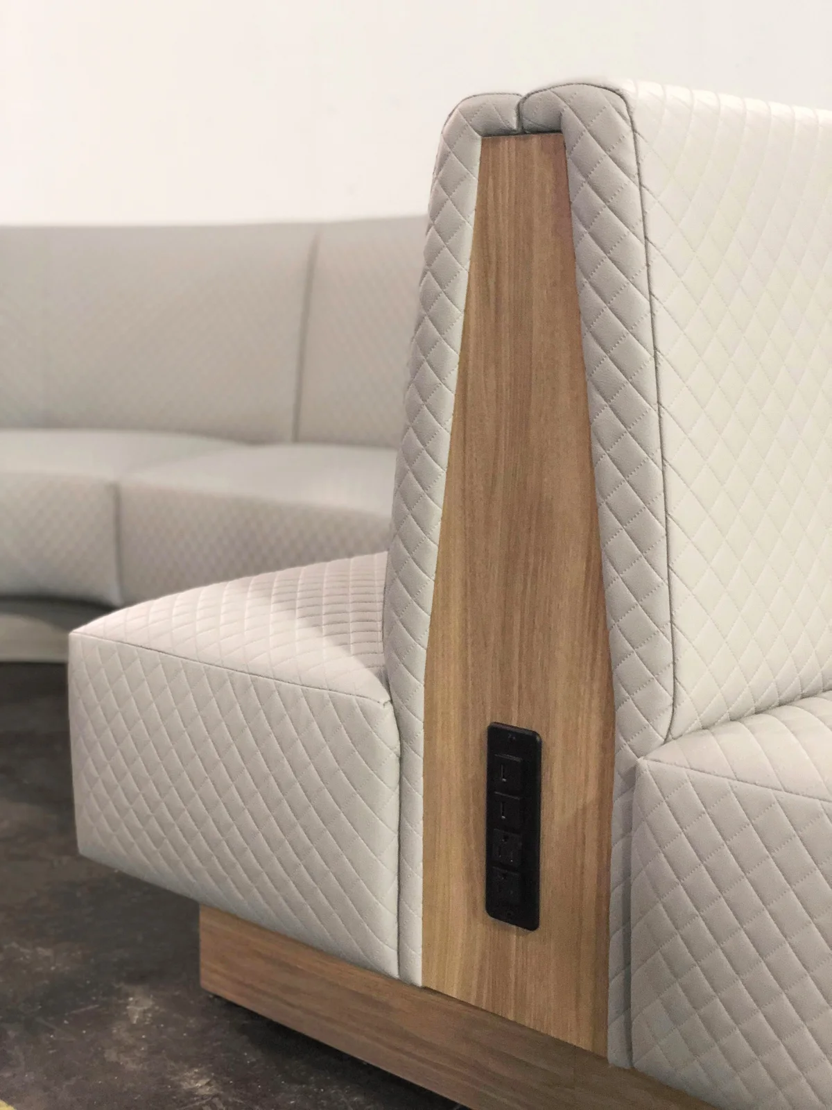 Banquette upholstery side detail for commercial seating projects