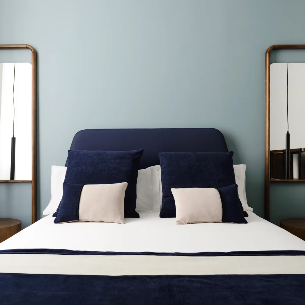 Hotel bedroom bed and nightstands for room layout planning