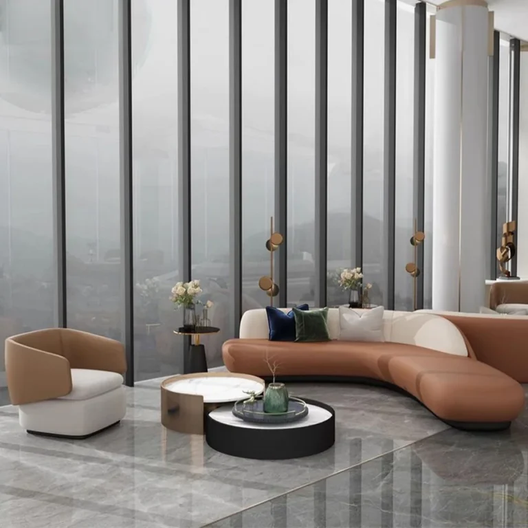 Curved sofa seating in a hotel lobby lounge scene