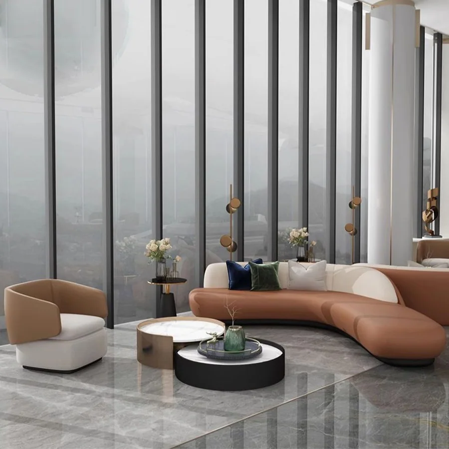 Curved sofa seating in a hotel lobby lounge scene