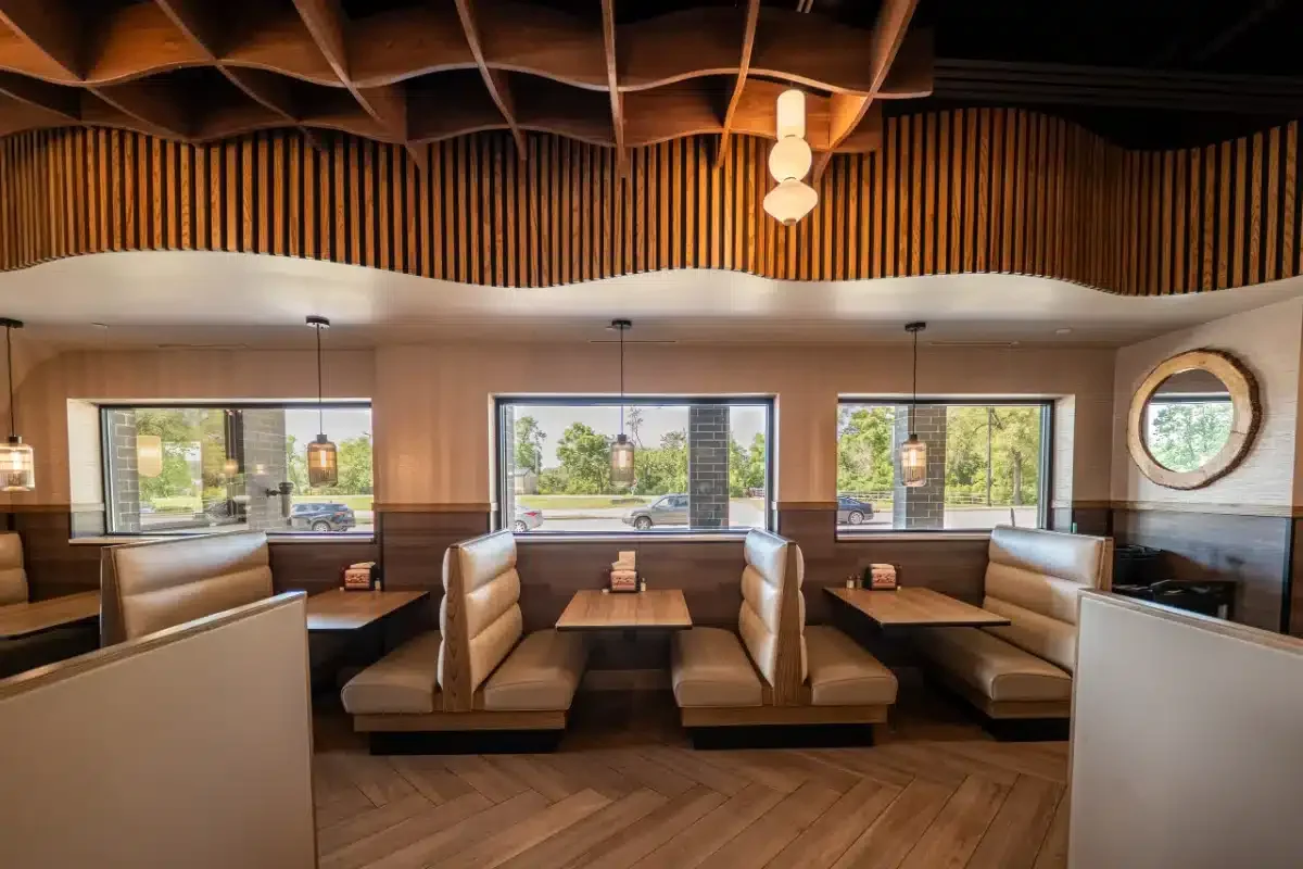 Custom restaurant booth seating installed in a dining space Custom restaurant booth seating installed in a dining space