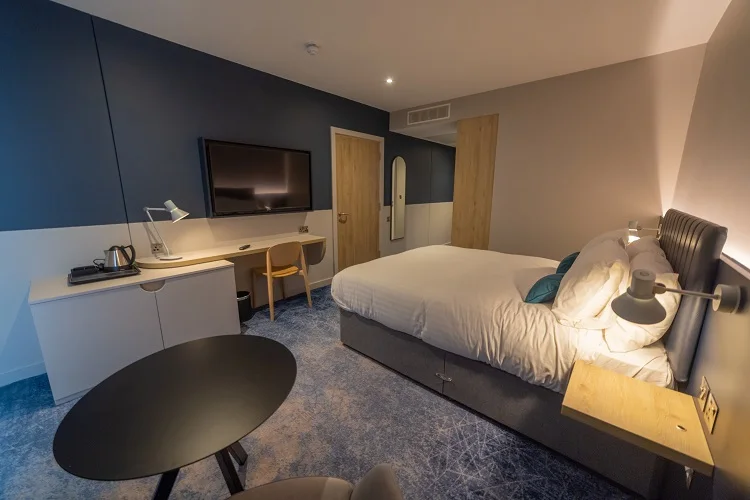 Hotel suite lounge chair and side table furniture setup