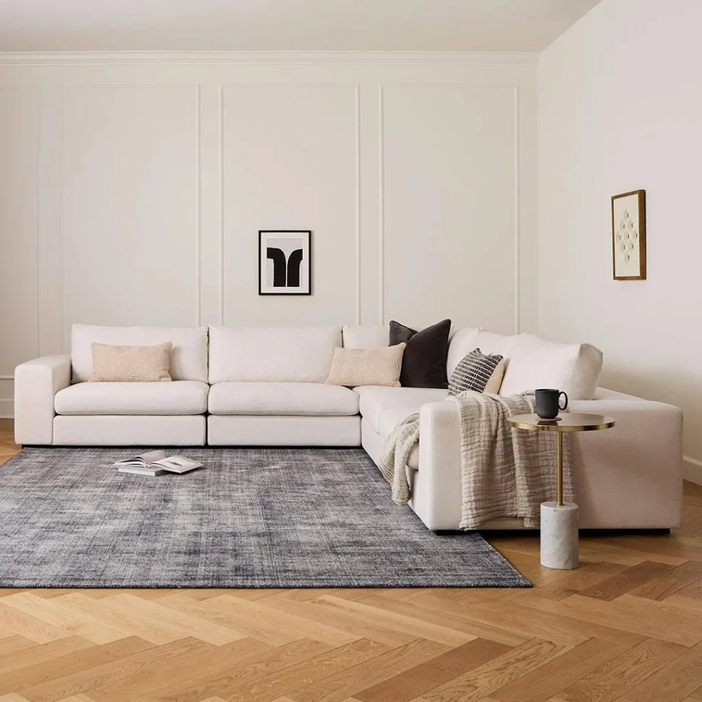 Modular sofa arranged as a corner living room layout