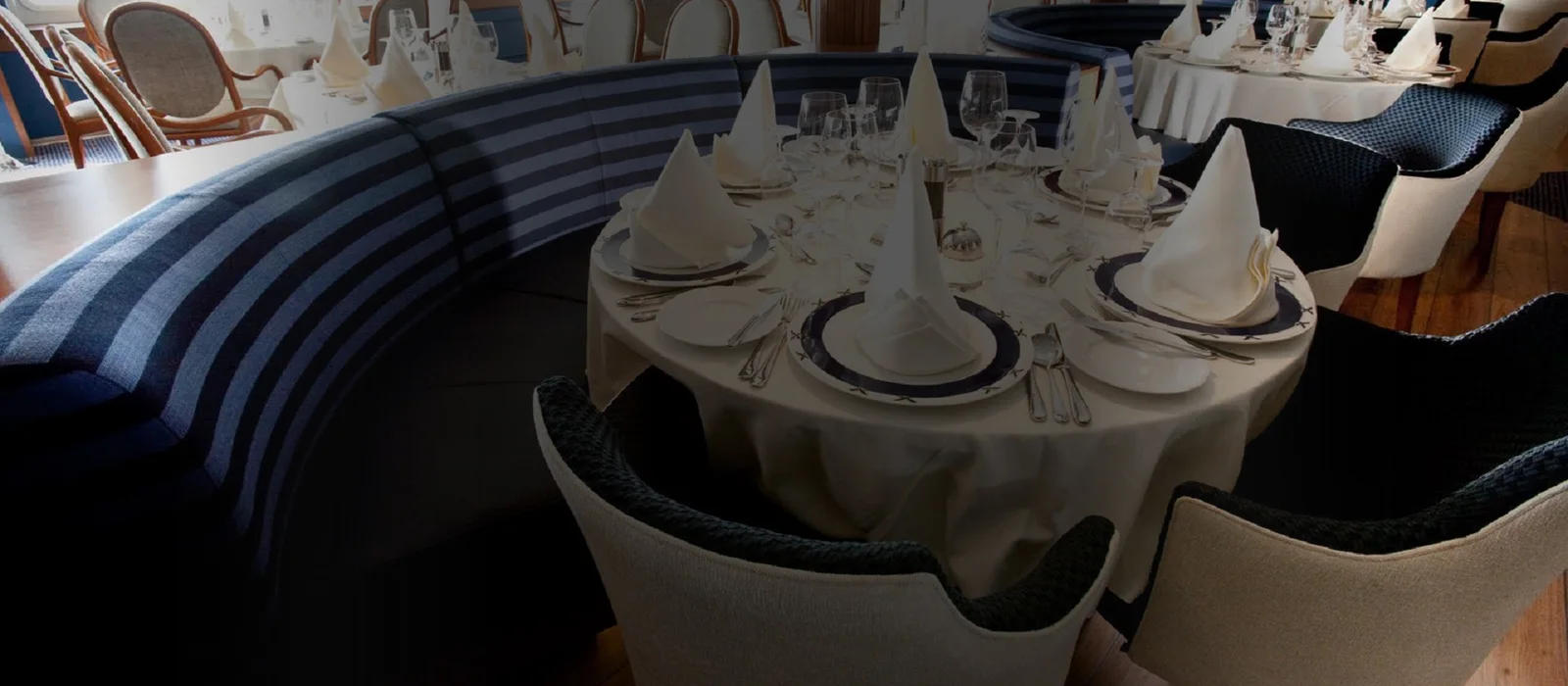 Long banquette seating in a restaurant interior