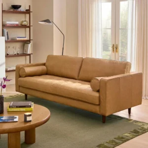 Sleeper sofa bed in an apartment room with compact layout