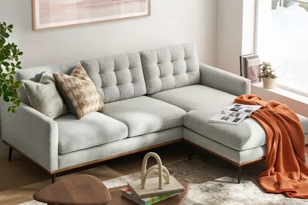 Small sectional sofa in a compact living room with chaise layout