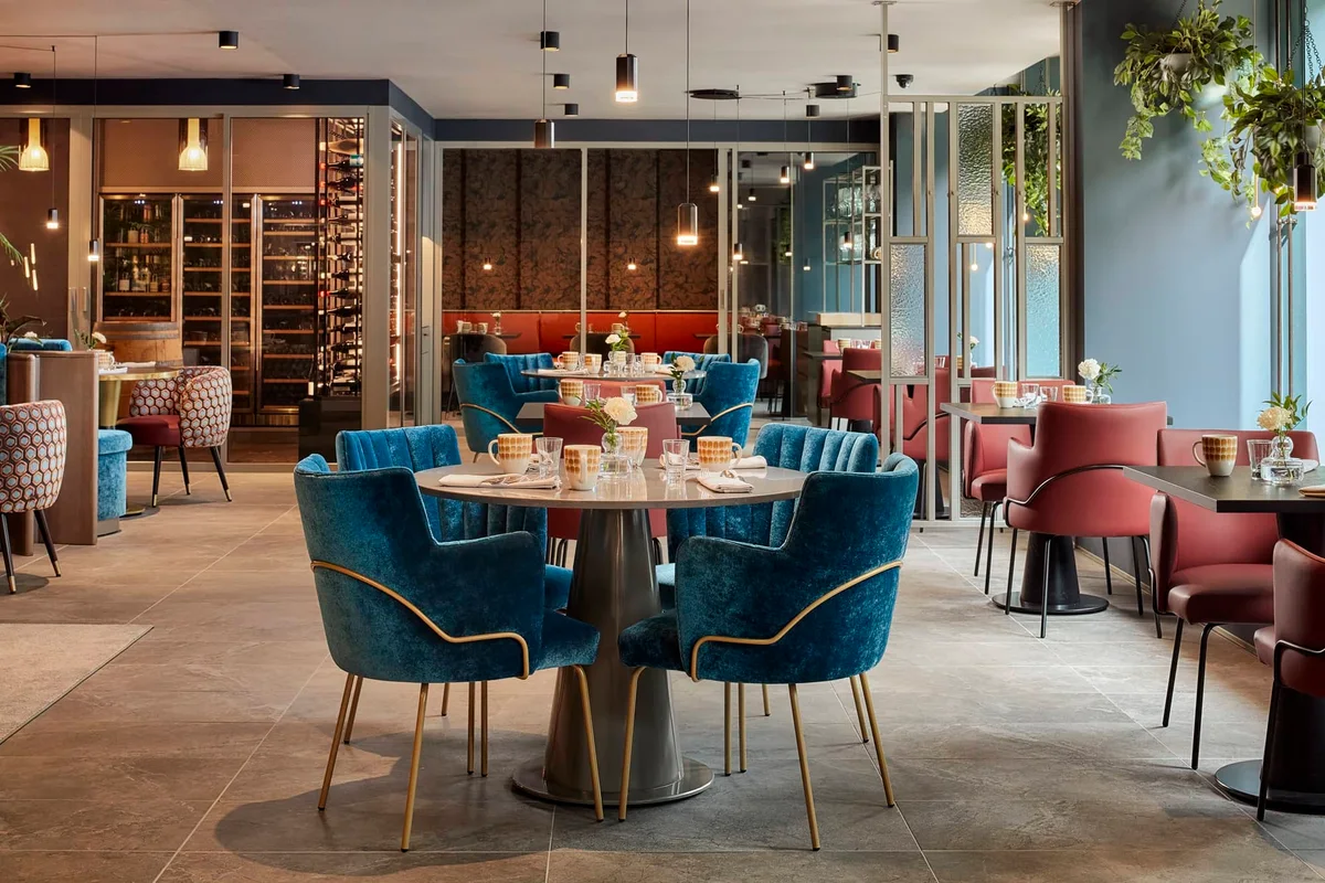 Upholstered restaurant dining chairs in a brasserie interior