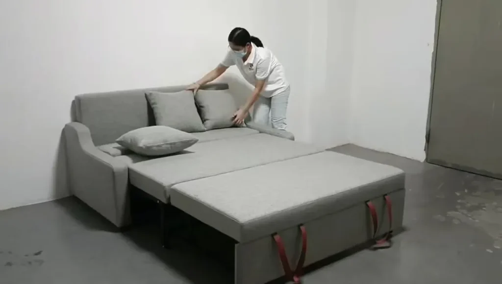 3 in 1 sofa bed shown in extended bed mode at HUAXUAN
