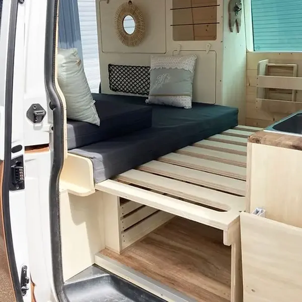 Compact camper sofa bed in closed seating position