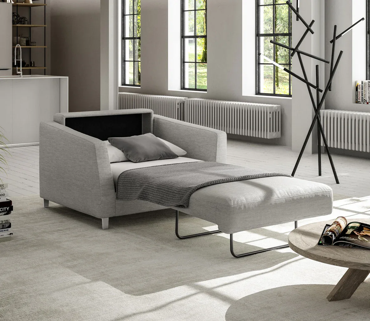 Compact pull-out sleeper sofa opened in a bright room layout