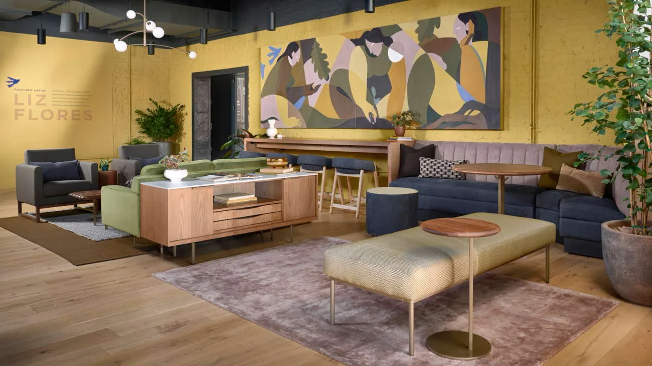 Commercial lobby lounge arranged with sofas, chairs and occasional tables