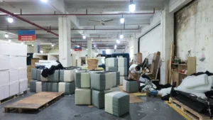 Poster frame of finished furniture staged in the HUAXUAN workshop before packing.