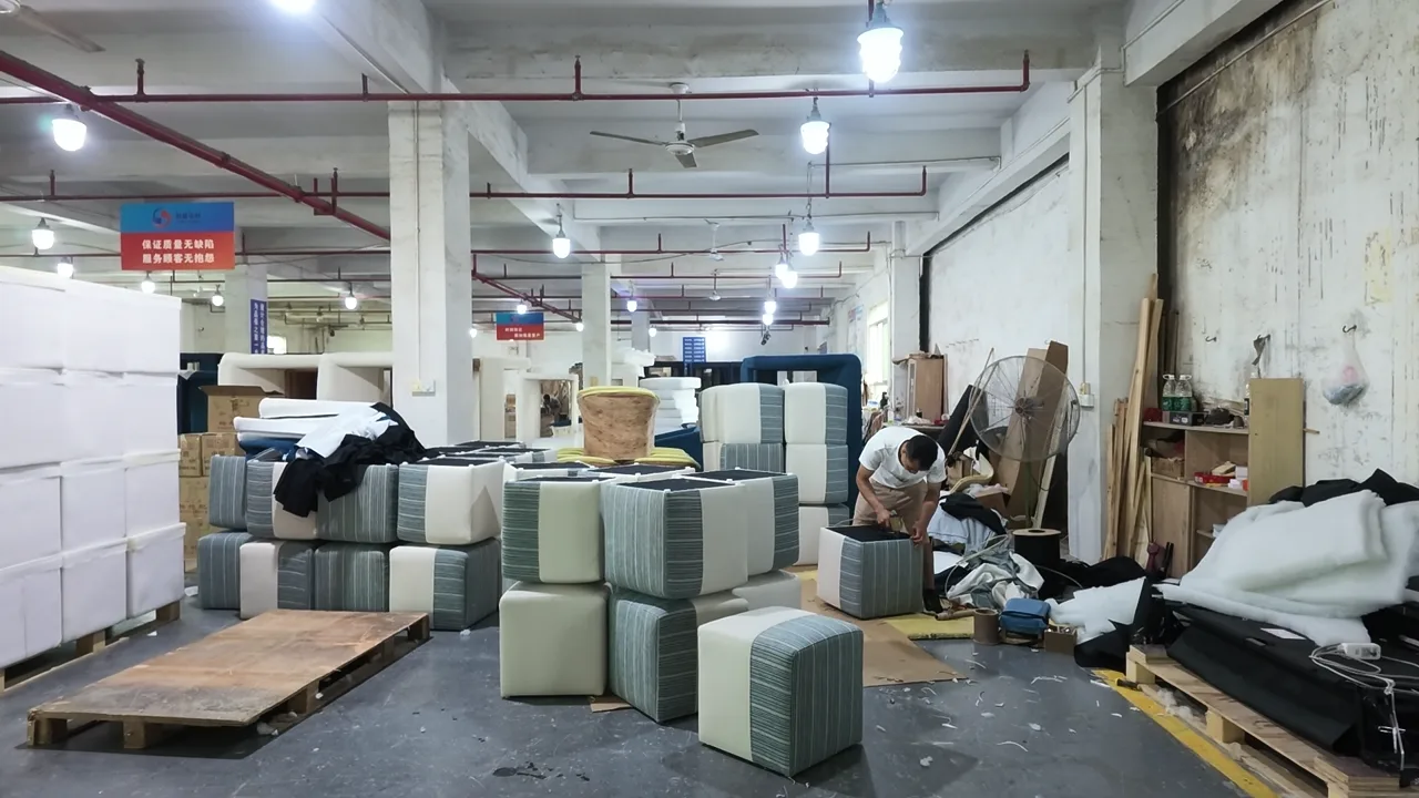 Finished furniture staged in the HUAXUAN workshop for order planning
