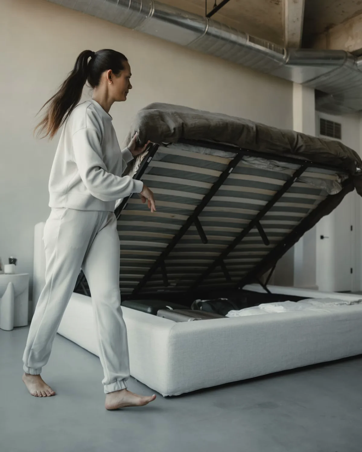 Lift-up storage bed frame opened with slat platform and under-bed storage Lift-up storage bed frame opened with slat platform and under-bed storage