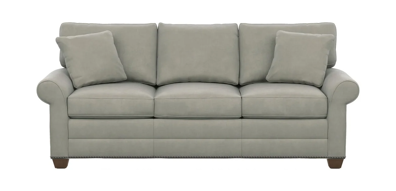 Rolled arm sofa with padded curved arm profile