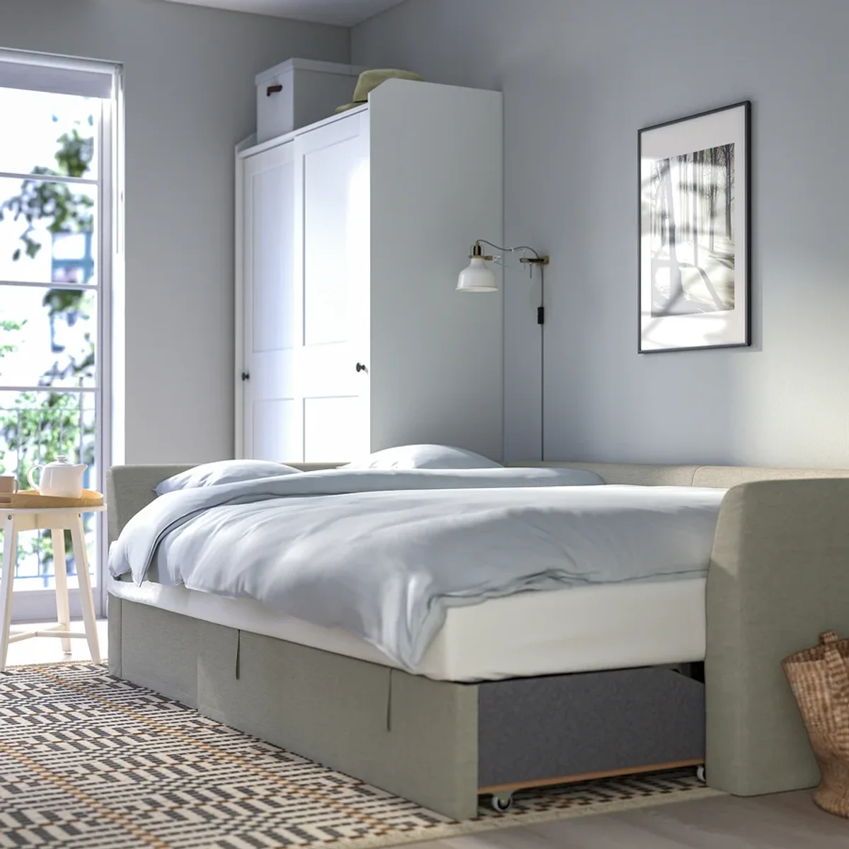 Sectional sleeper sofa opened as a bed in a room Sectional sleeper sofa opened as a bed in a room