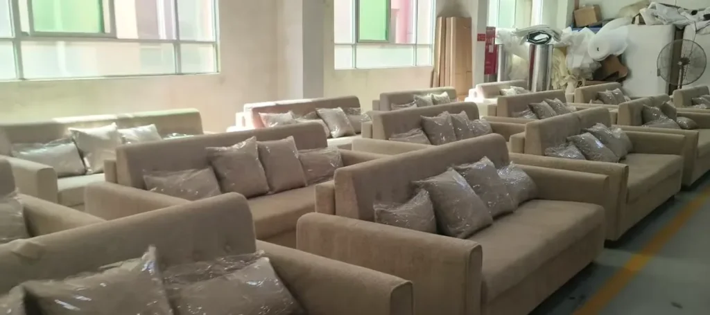 Sofa bed packaging review during warehouse staging before shipment