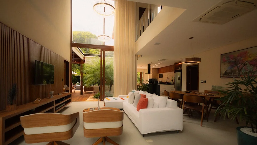 Apartment sofa positioned across from a TV wall