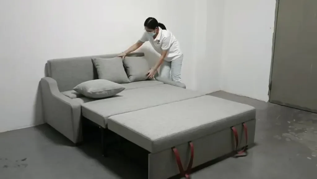 Comfortable sleeper sofa opened for sleeping in a room setting
