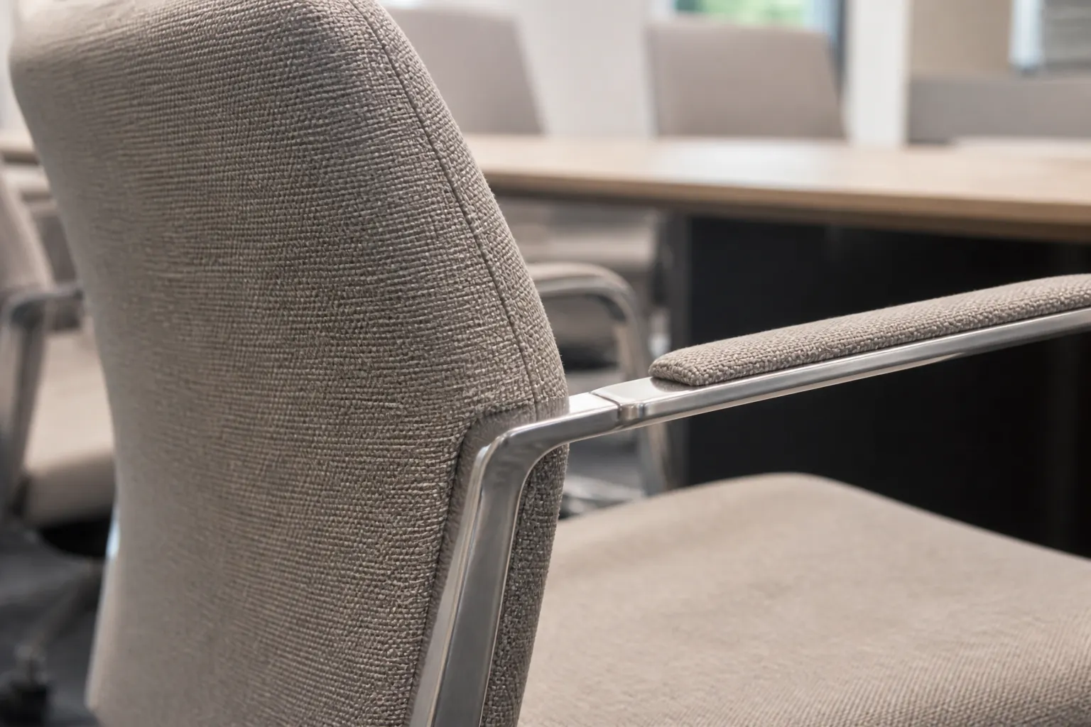 Commercial conference chair fabric stitching armrest and metal frame detail