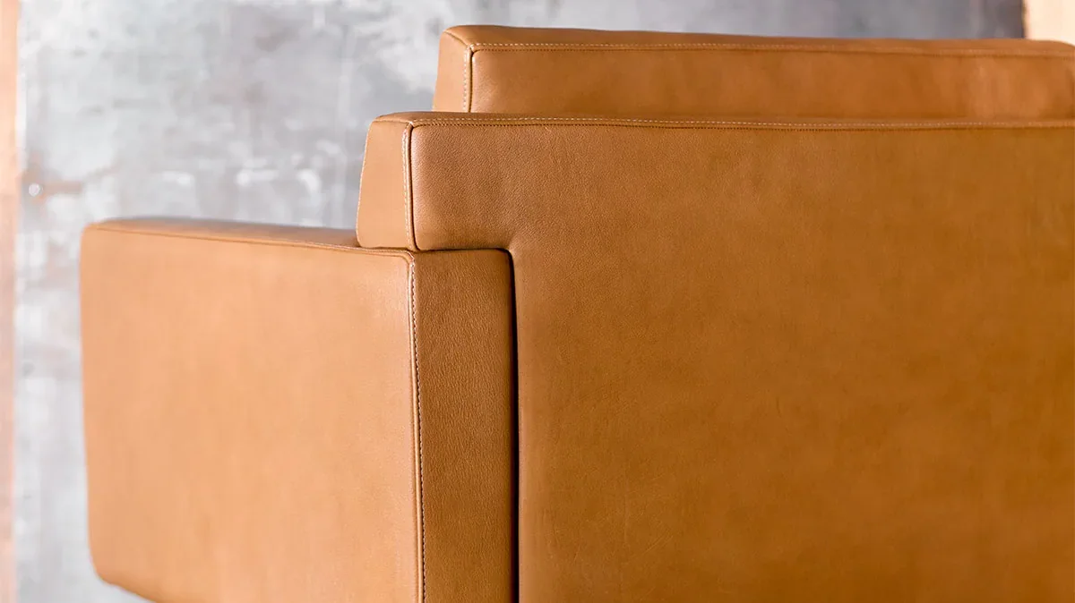Leather sofa seam edge and piping close-up