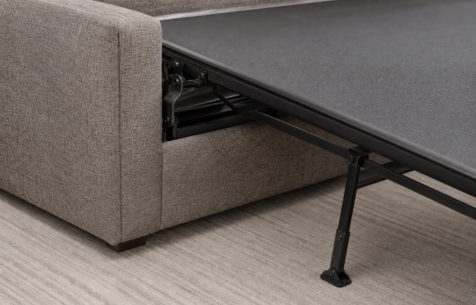 Sleeper sofa frame support and upholstery maintenance detail