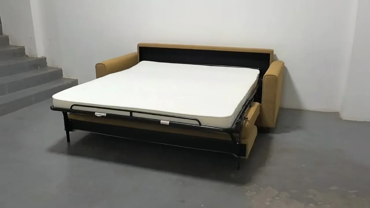 Sleeper sofa mattress and support frame opened for comfort inspection