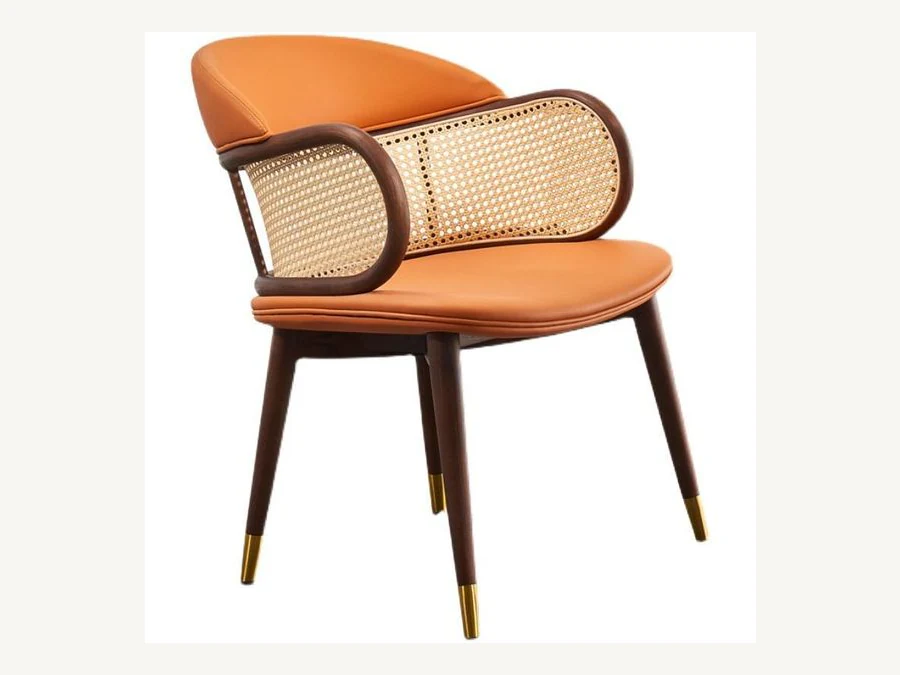 Cane loop-arm dining chair with upholstered seat and tapered legs