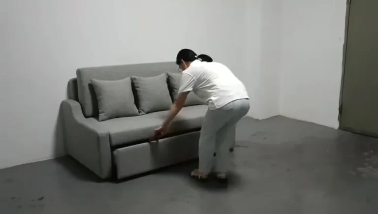 Compact pull-out sleeper sofa in its closed seating mode