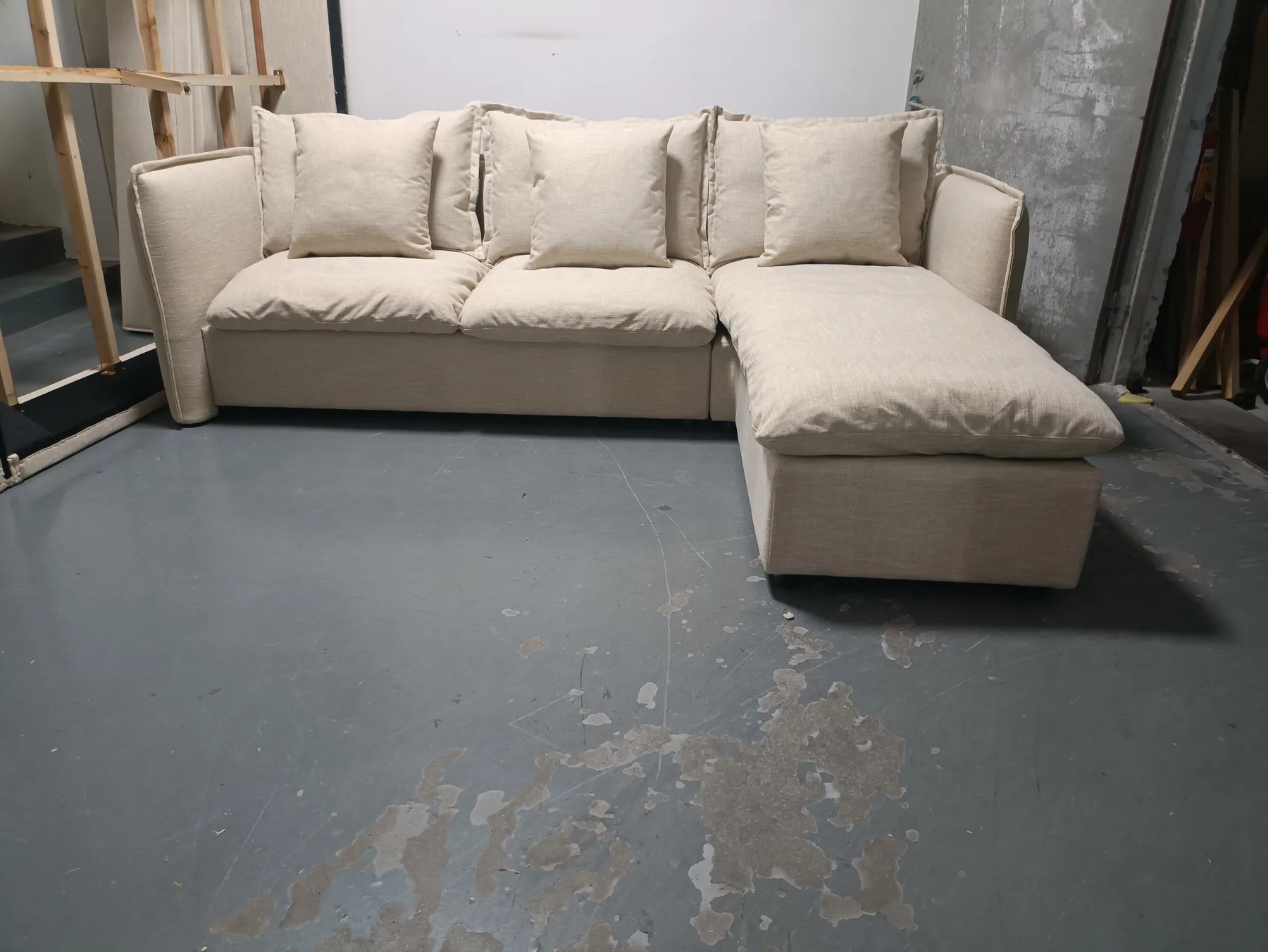 Deep seating cream sectional sofa with a long chaise return