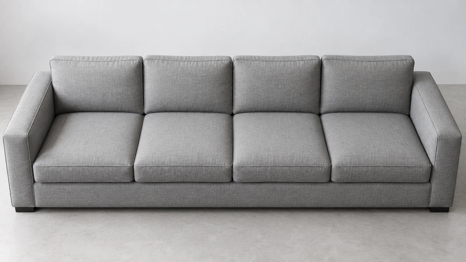 Four-cushion sofa layout Four separate seat cushions on an extra wide upholstered sofa