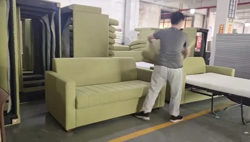 Green modern sleeper sofa with simple cushions during demonstration