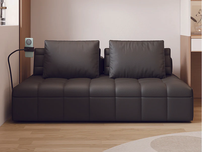 Black armless manual pull-out sofa bed with square grid-tufted seat