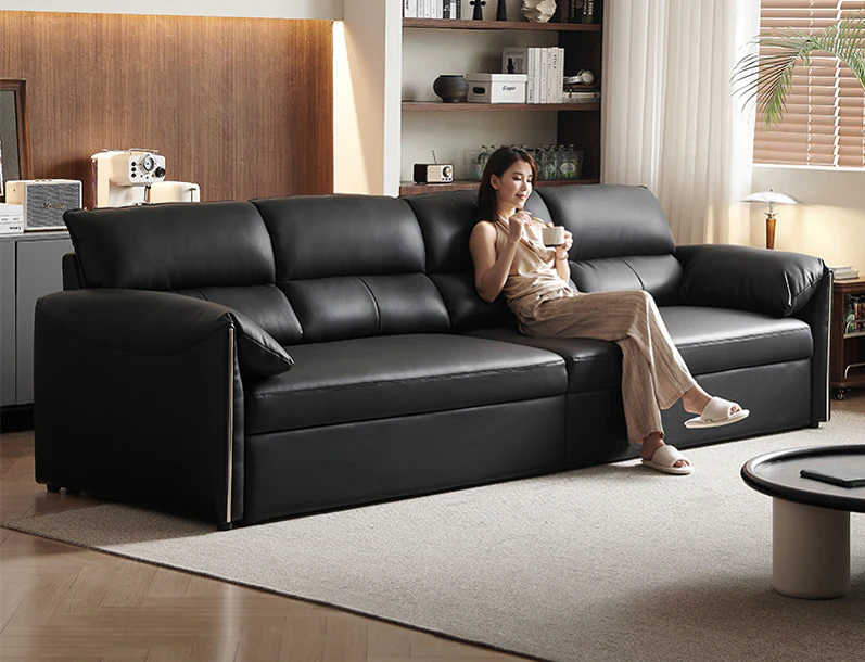 Black track-arm pull-out sofa bed with divided seats and back cushions