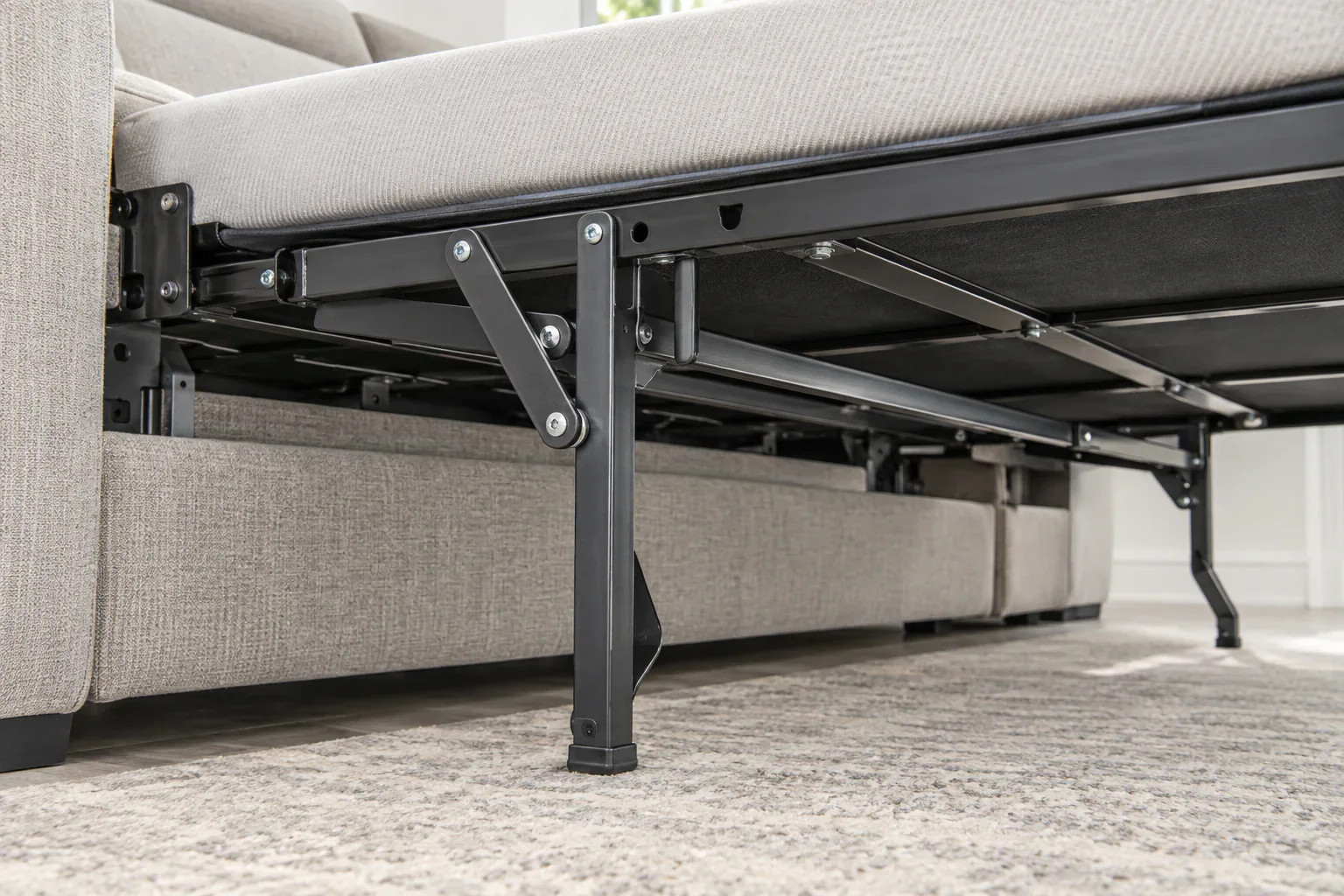 Reinforced pull-out frame detail on a large king sofa bed