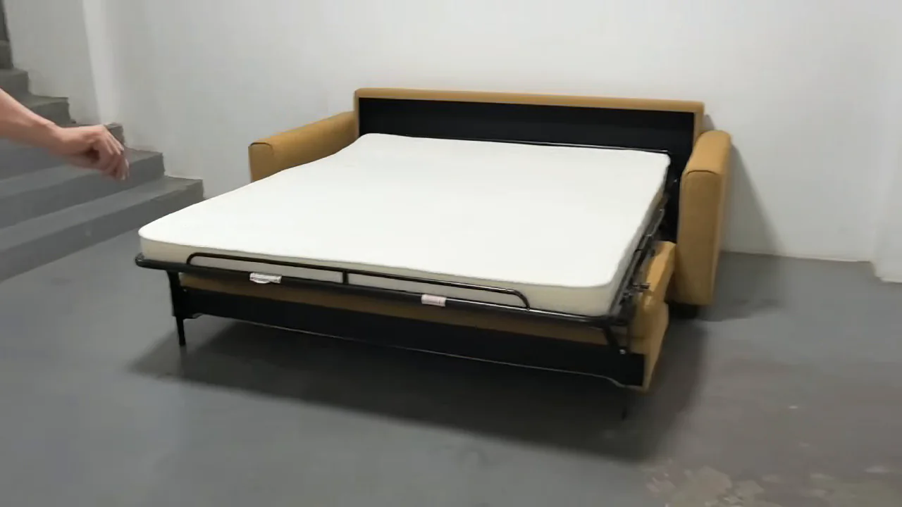 Mustard upholstered pull-out sleeper sofa fully opened into bed mode
