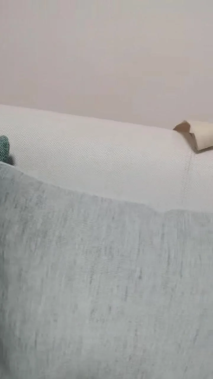 Close view of sleeper sofa upholstery and cushion surface