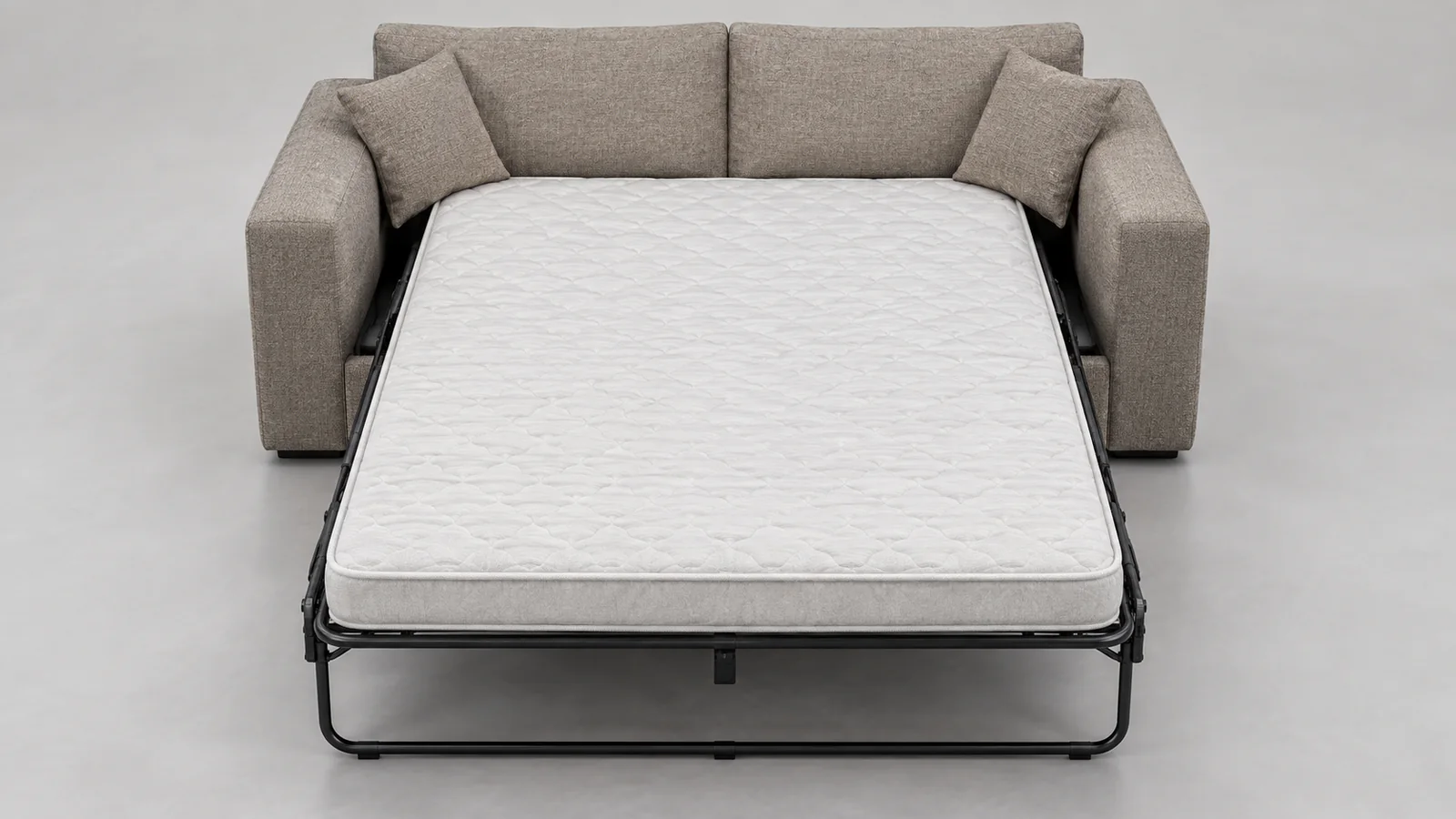 Open sleeper sofa showing mattress width between wider outer arms