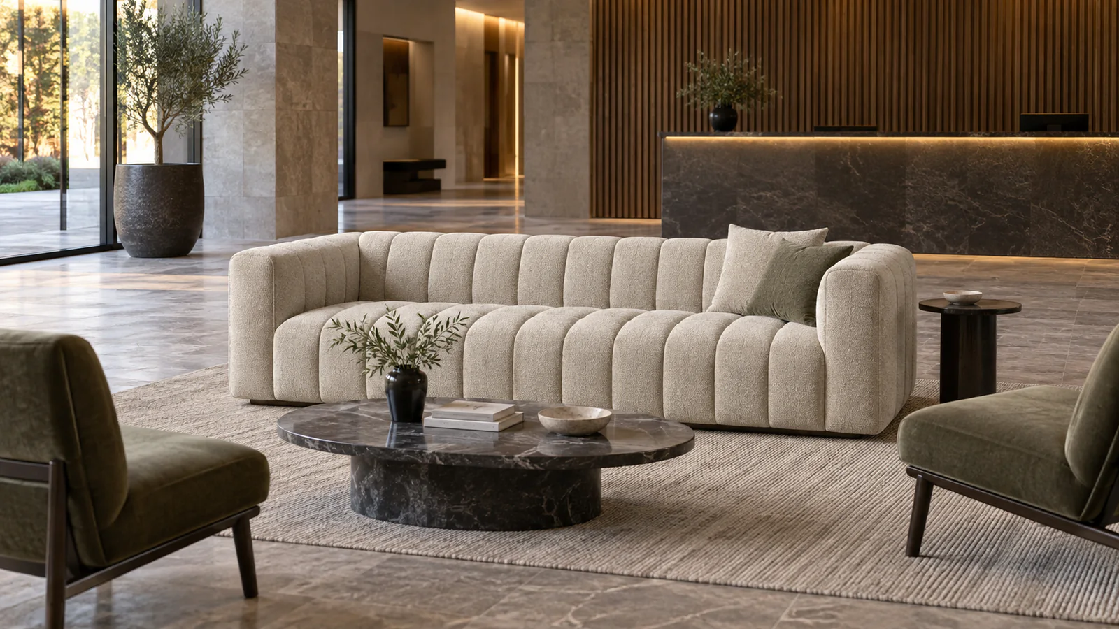 Channel tufted sofa in a clean contemporary hotel lobby