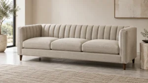 Modern warm neutral sofa with precise vertical channel tufting