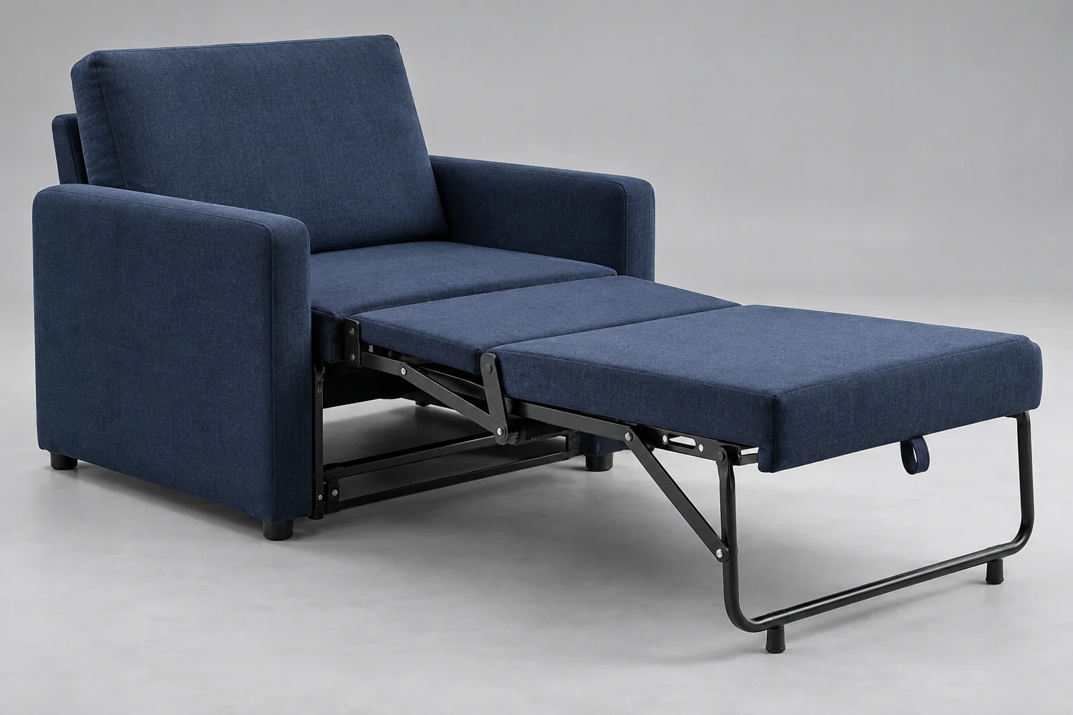 Compact twin chair sleeper halfway through fold-out conversion