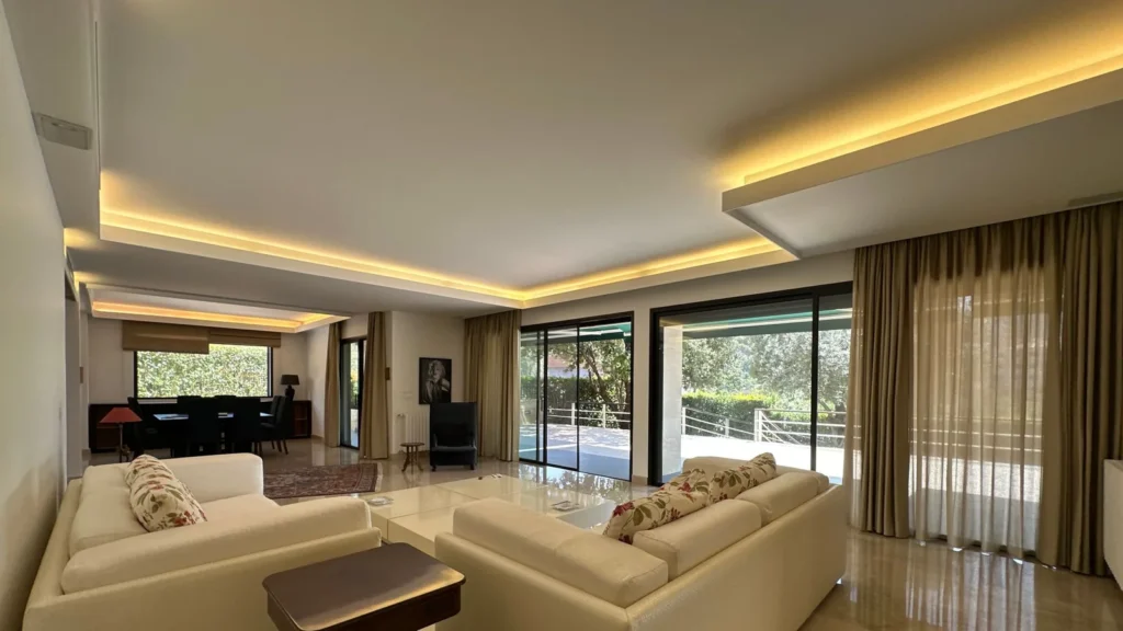 Application reference: upholstered seating in a bright living room with large windows