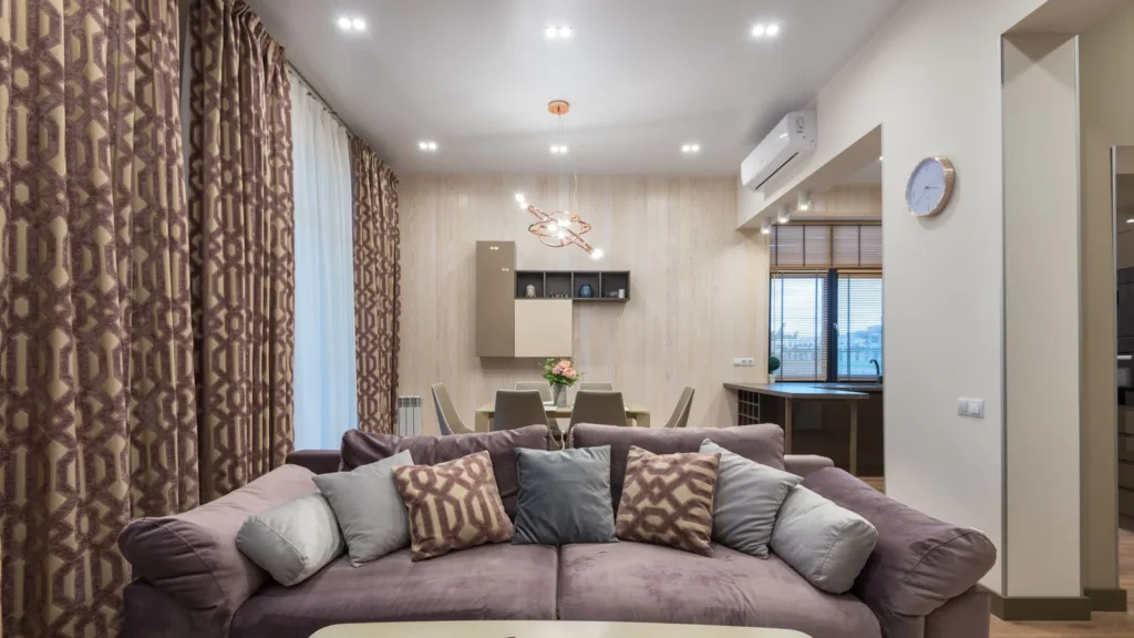 Application reference: an upholstered sofa with cushions beside a dining area