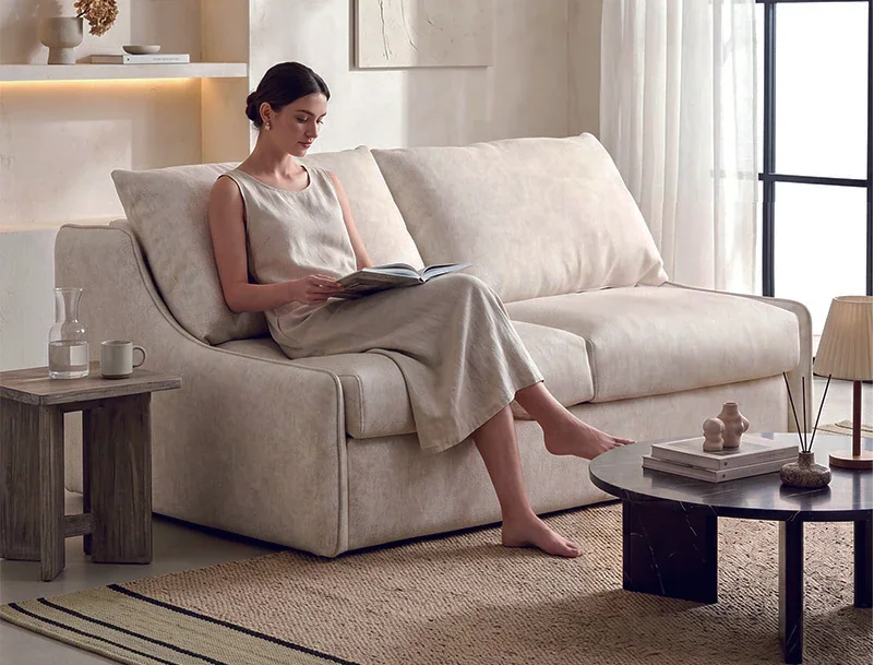 HX-SFB-044 ivory flared-arm sofa bed in a furnished living space