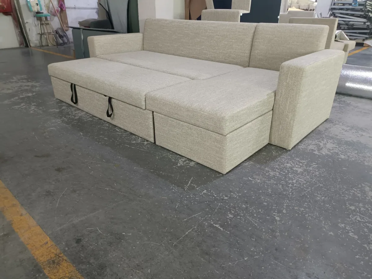 Beige sectional sofa bed with the central sleeping platform extended