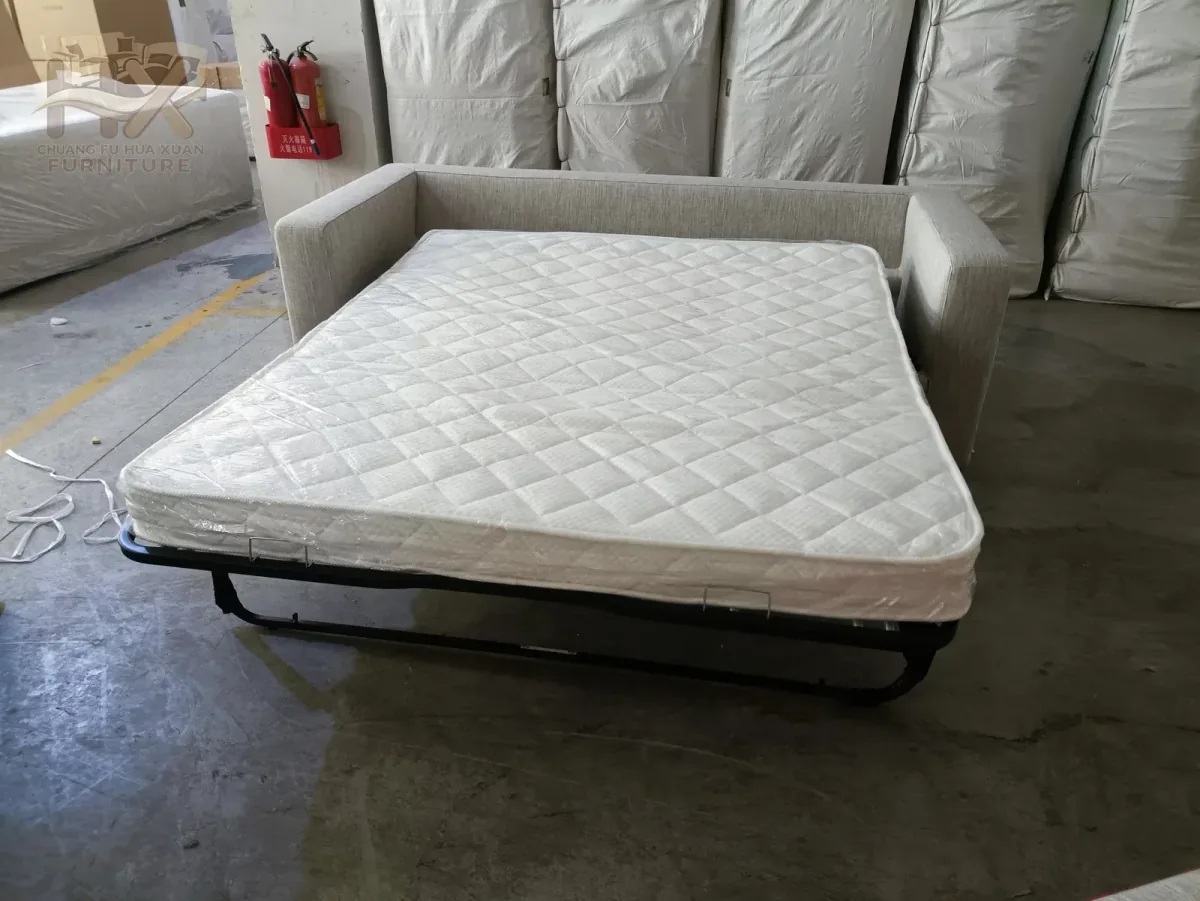 Light grey HX-SFB-001 sofa bed opened with its mattress and support visible